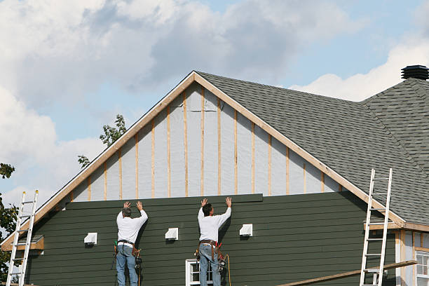 Professional Siding Installation technician working in Villanova, PA